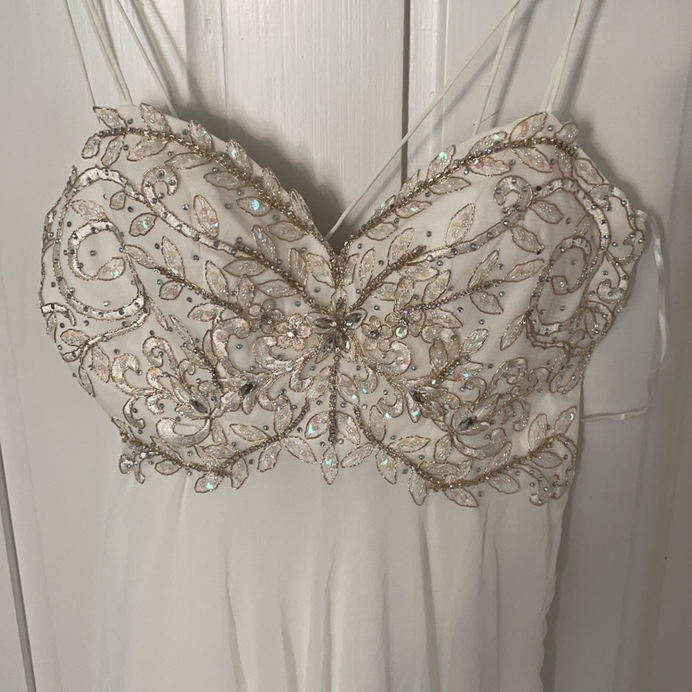Beautiful White maxi dress with sequins on top